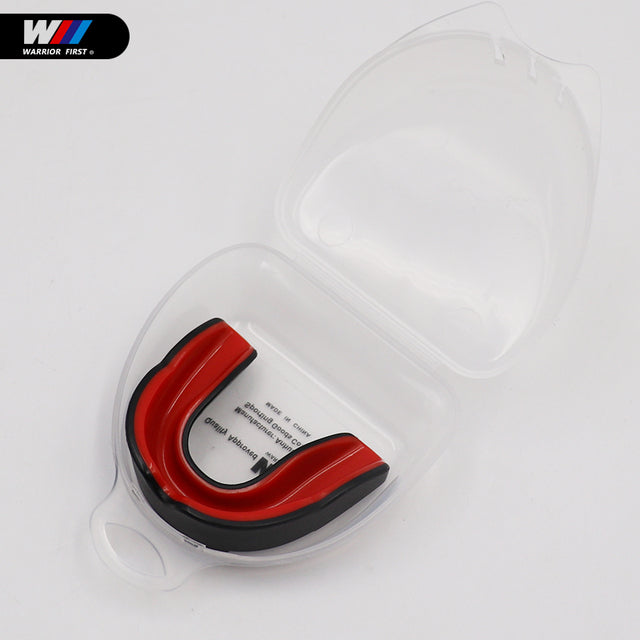 red and black mouth guard with clear case and white background