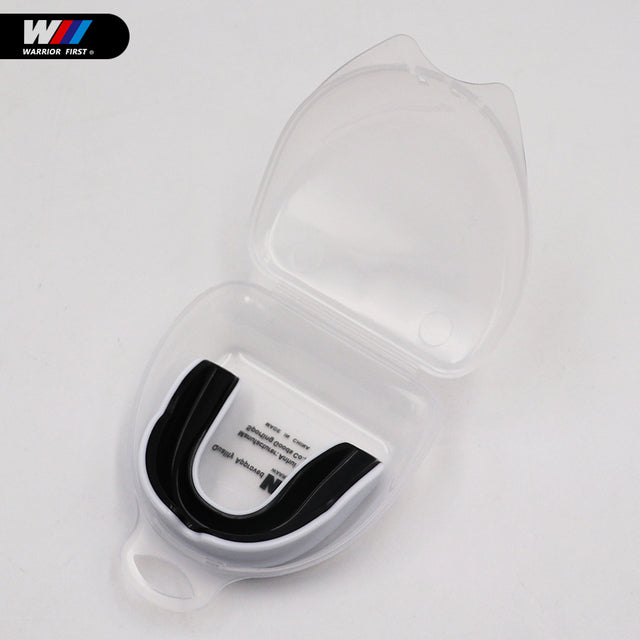 white and black mouth guard with clear case and white background