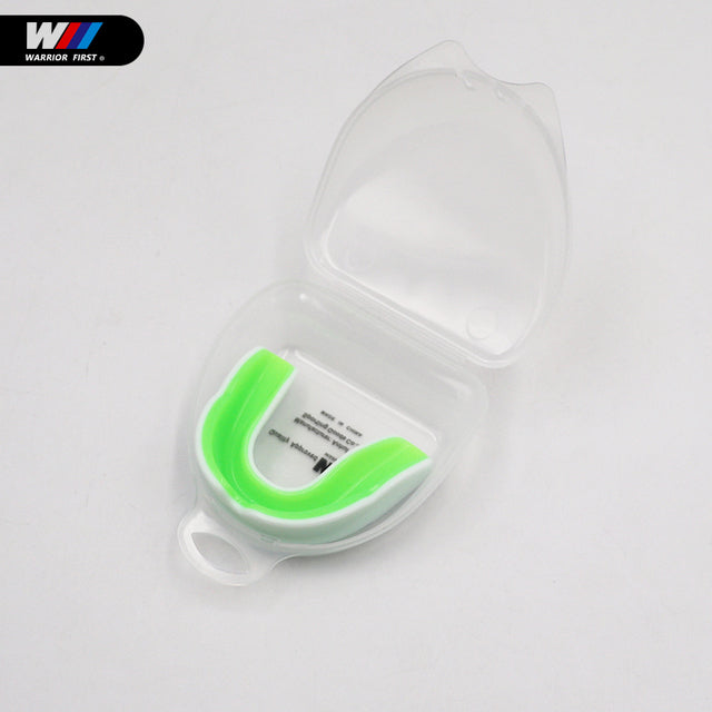 white and green mouth guard with clear case and white background