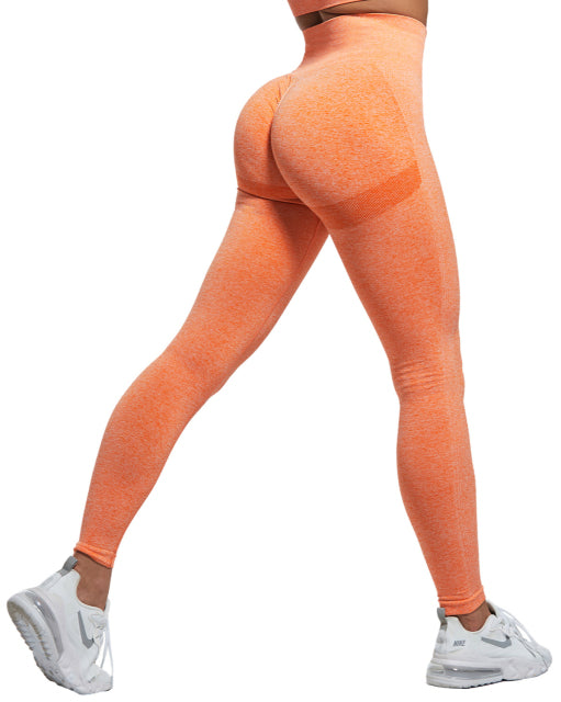 girl wearing orange yoga pants