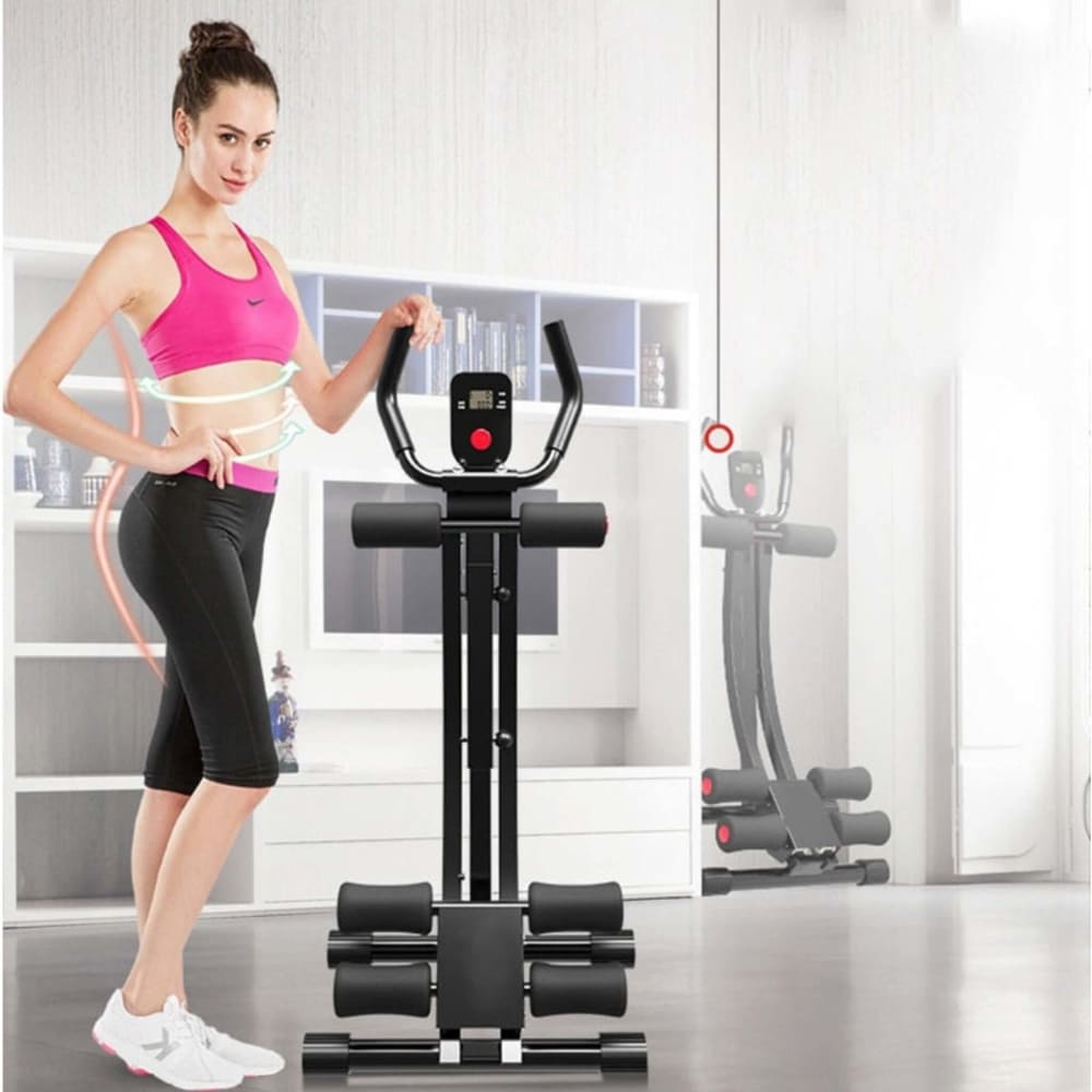 girl in room wearing pink shirt and black pants with fitness abs machine