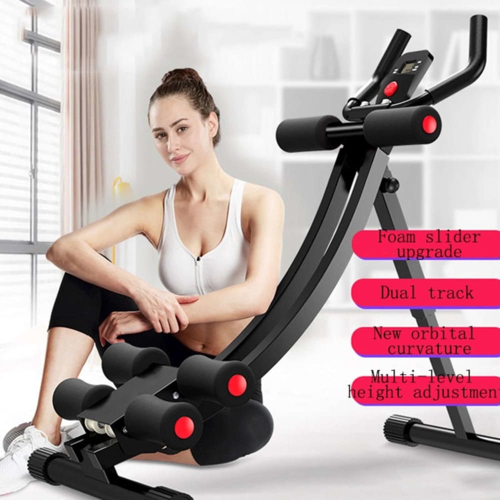 girl sitting next to ab machine on floor