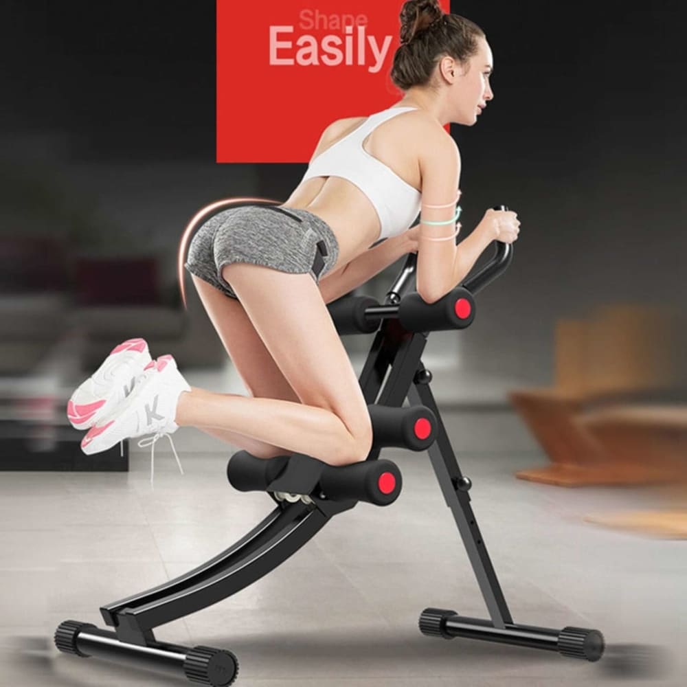 girl using ab machine with blurred background and words shape easily