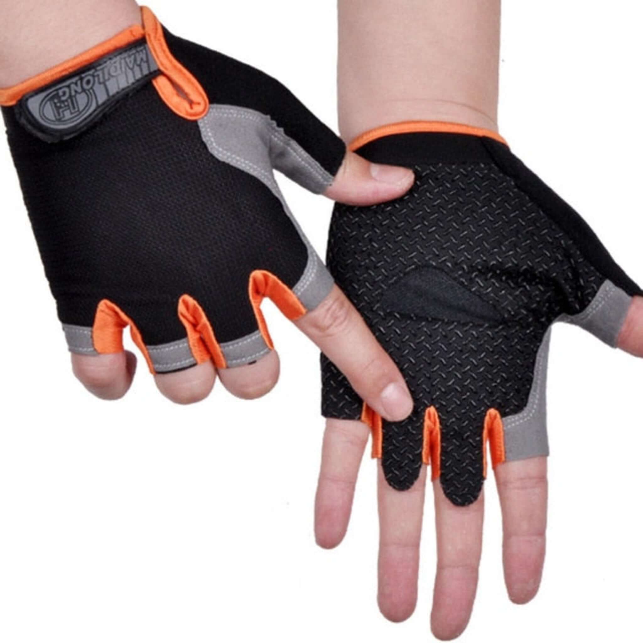 hands wearing black, orange and gray half finger cycling gloves with white background