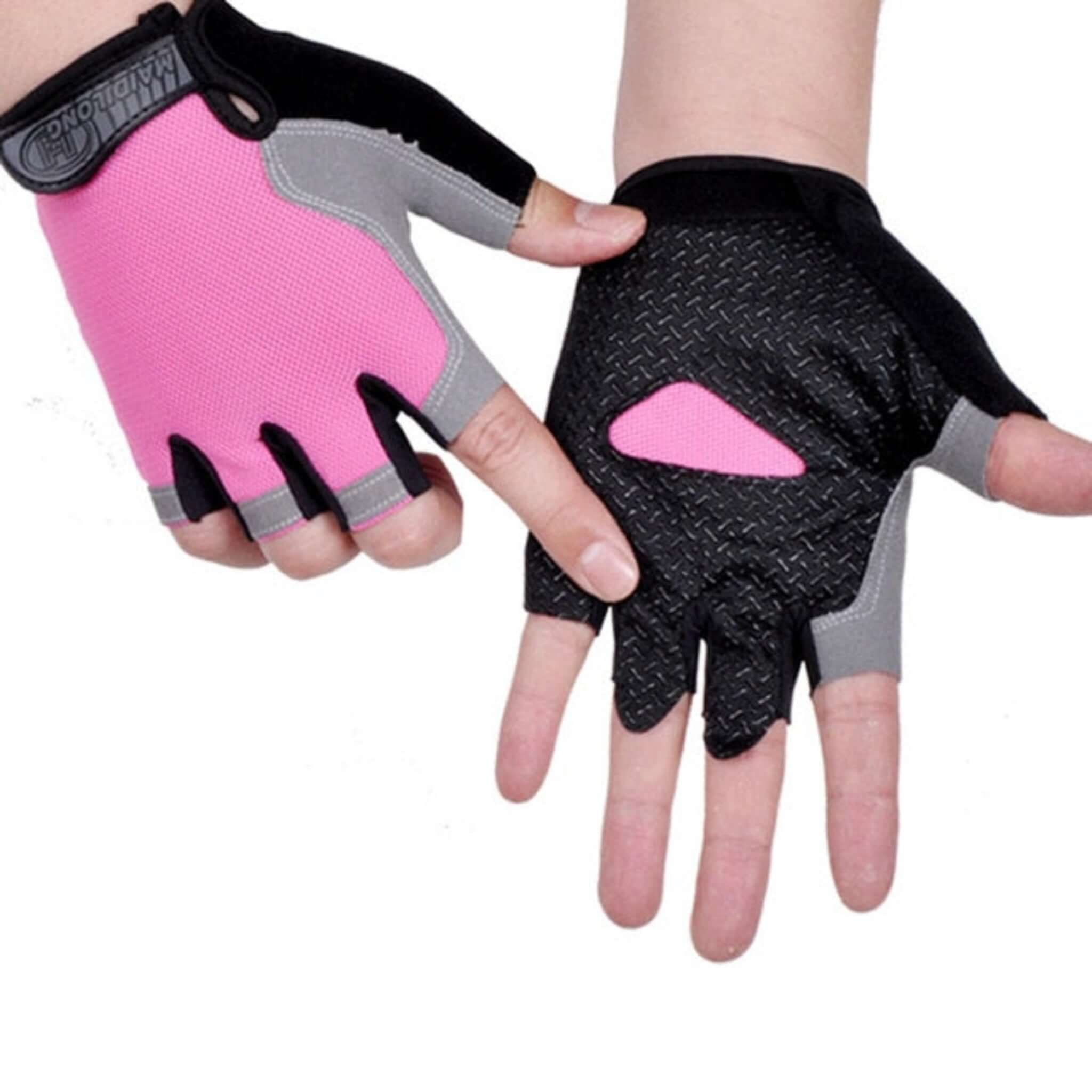 hands wearing pink black, and gray half finger cycling gloves with white background