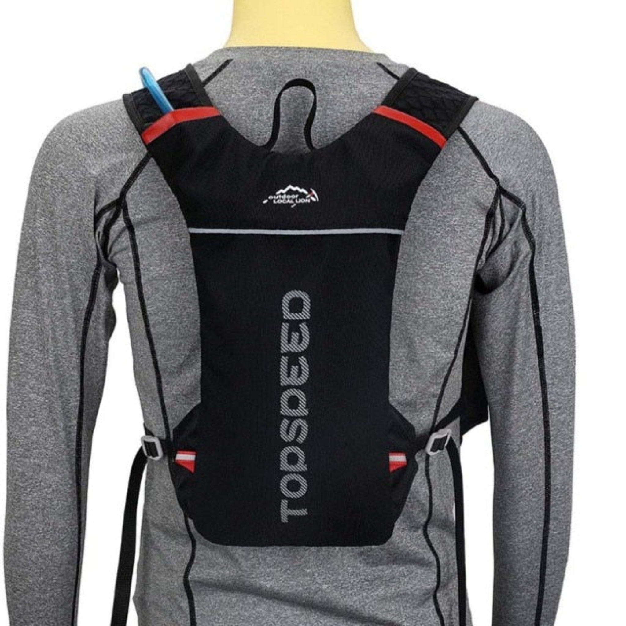 man wearing black topspeed hydration pack holder with white background