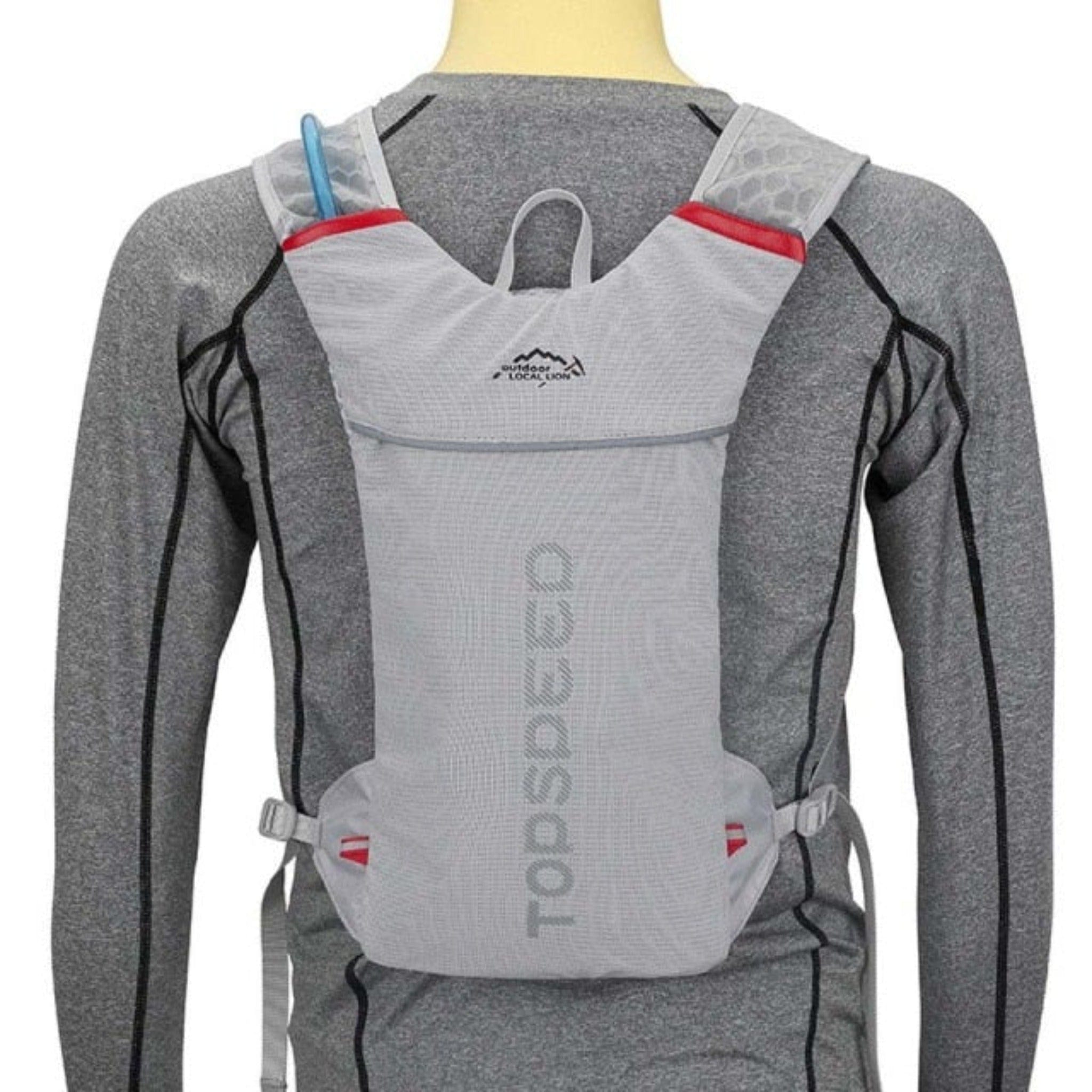 man wearing gray topspeed hydration pack holder with white background