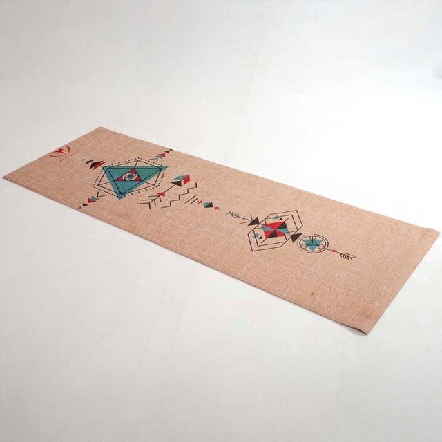 tan yoga mat with design on it and white background