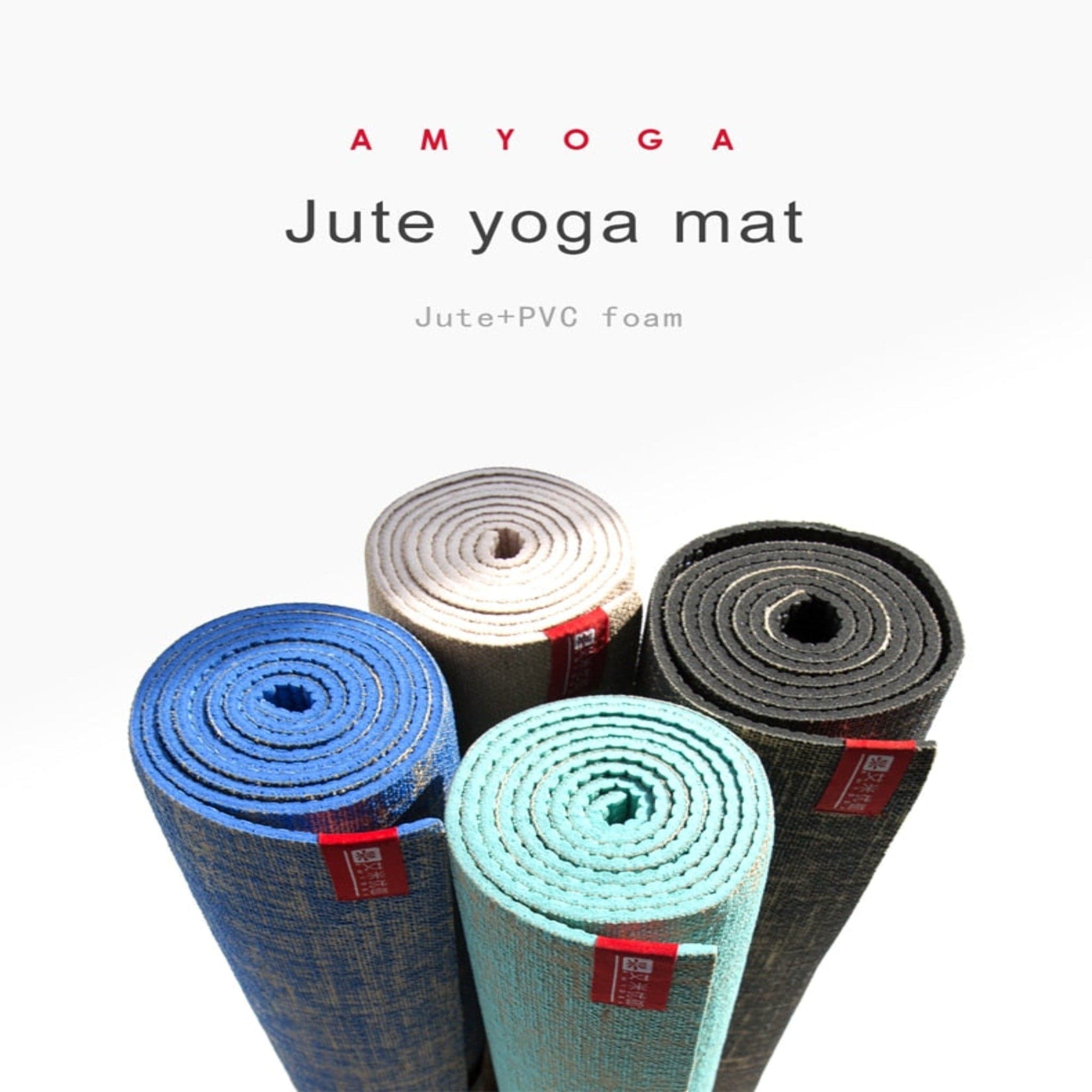 dark blue, white, black, and light jute blue yoga mats rolled up with white background