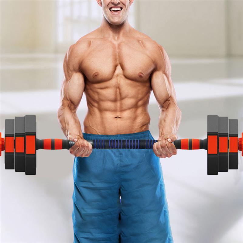 man holding black and orange barbell