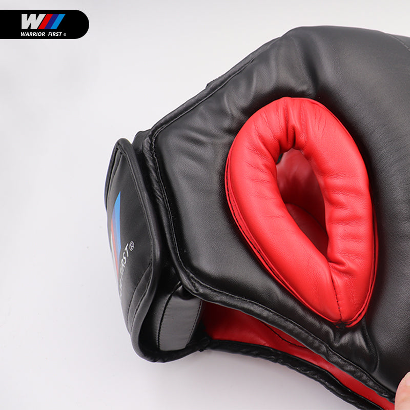 side view of boxing head gear with white background