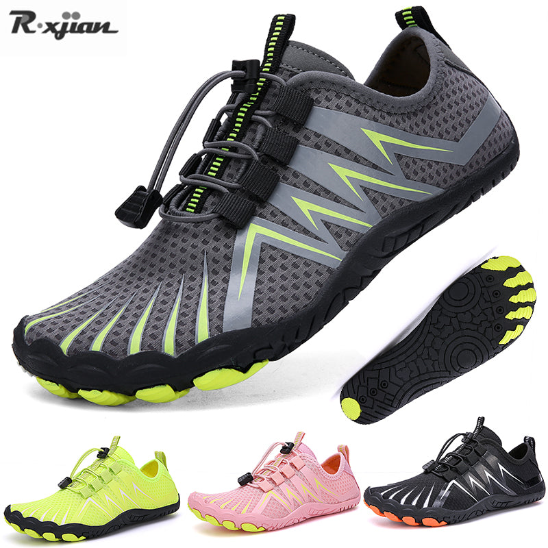 display of green, pink, black, and orange water shoes with white background